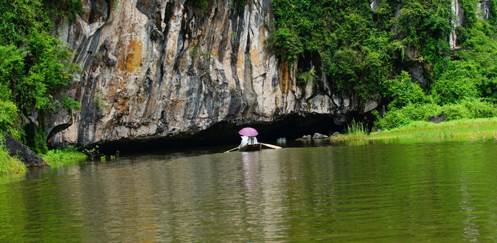 Begin your historical exploration with Tam Coc’s tranquil ambiance